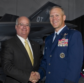 (pictured left to right) Orlando Carvalho and Maj. Gen. Jeffrey Lofgren