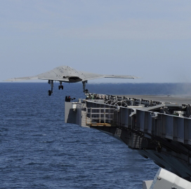Navy Tests Northrop's X-47B Drone On USS Theodore Roosevelt - top government contractors - best government contracting event