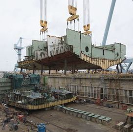 Huntington Ingalls Sets Up "Superlift" Structure for Aircraft Carrier Construction; Mike Shawcross Comments - top government contractors - best government contracting event